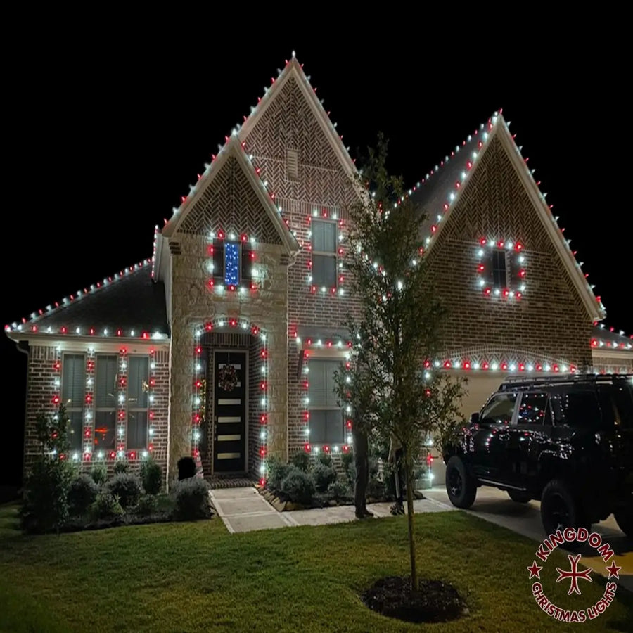House decorated with Christmas lights at night