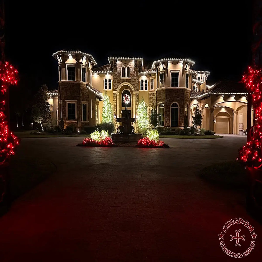 Luxurious mansion decorated with Christmas lights at night