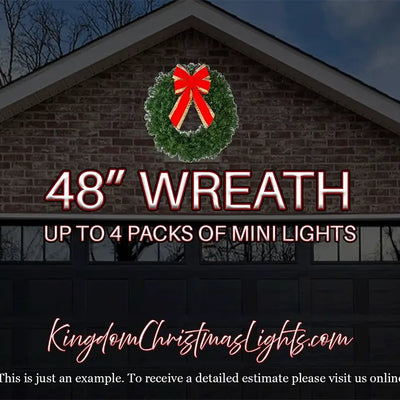 Advertisement for a 48-inch wreath and mini lights on a brick building with a dark sky.