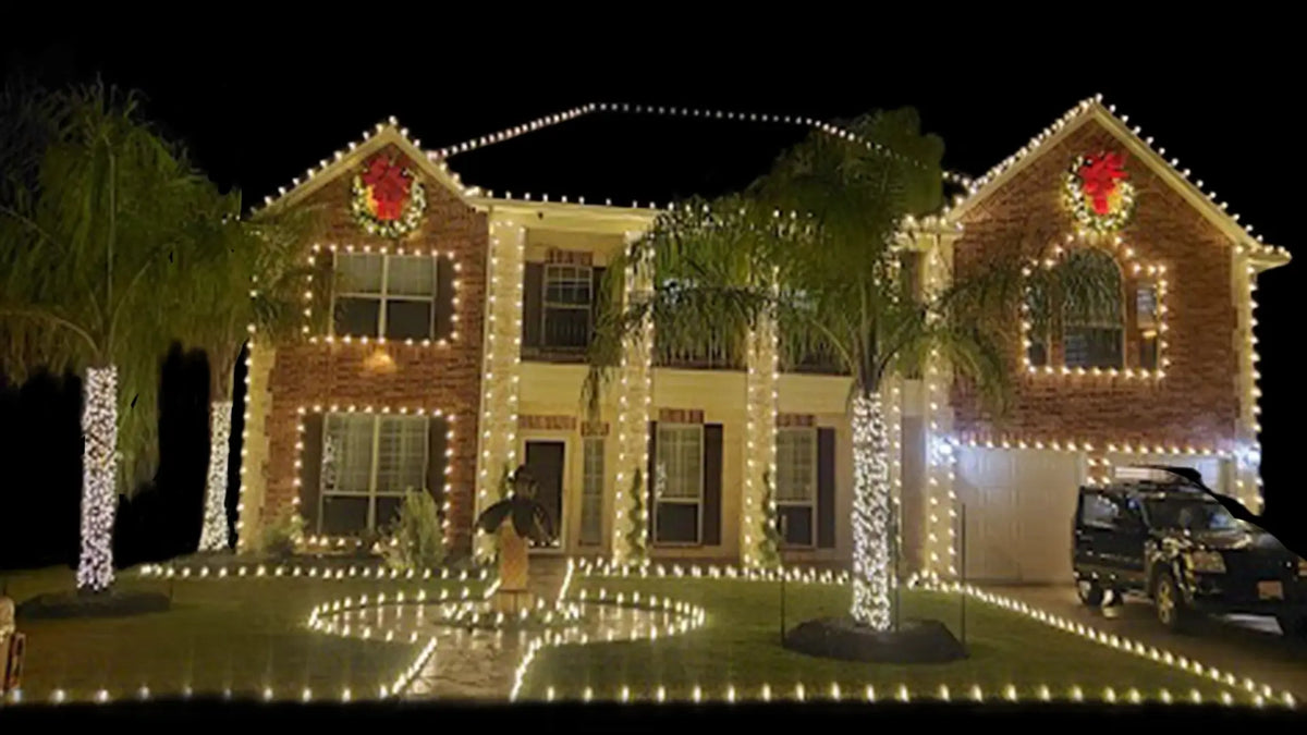 House decorated with Christmas lights at night