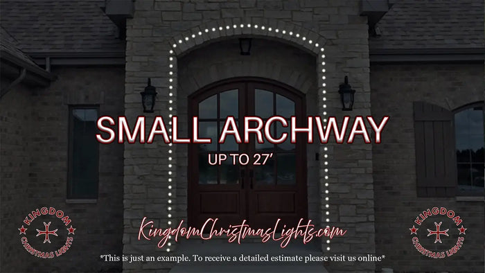 Small archway with decorative lights on a stone building, featuring text about dimensions and a website URL.