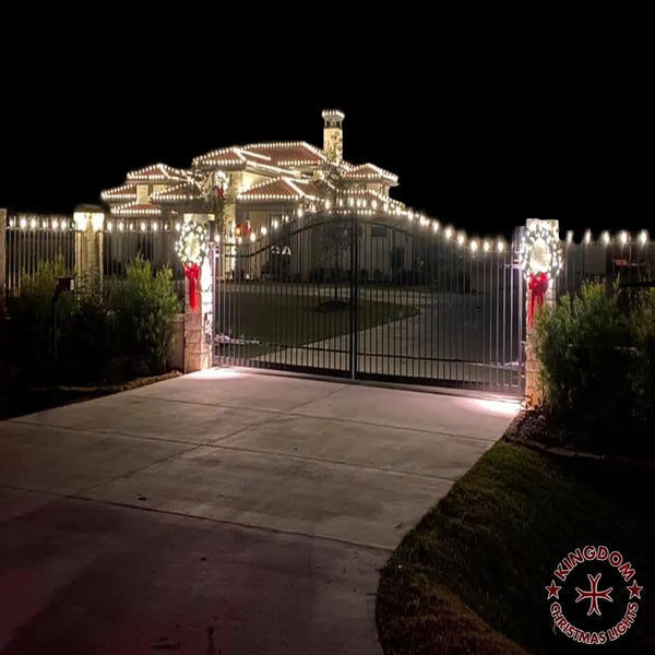 Decorative Christmas lights on a house exterior at night